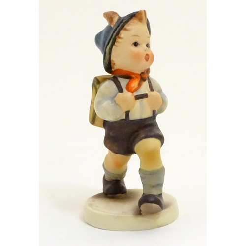 127 - A collection of seven vintage Hummel figurines, comprising #47 Goose Girl, #58/0 Playmates, #63 Sing... 