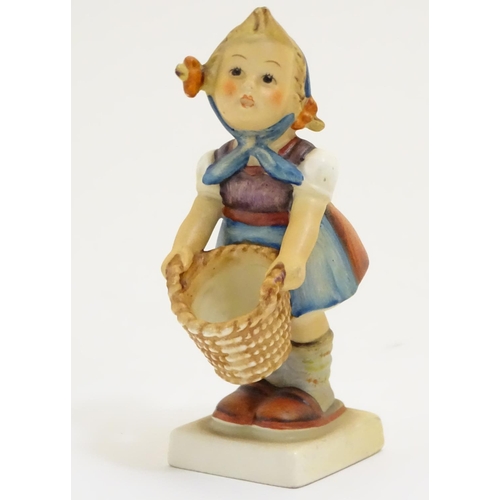 127 - A collection of seven vintage Hummel figurines, comprising #47 Goose Girl, #58/0 Playmates, #63 Sing... 