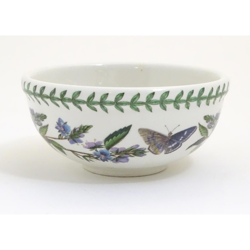 133 - Five items of Portmeirion wares comprising a large bowl, an oval serving plate, two dishes and a cer... 