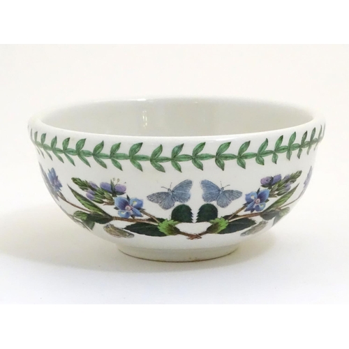 133 - Five items of Portmeirion wares comprising a large bowl, an oval serving plate, two dishes and a cer... 