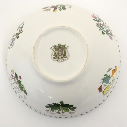 133 - Five items of Portmeirion wares comprising a large bowl, an oval serving plate, two dishes and a cer... 