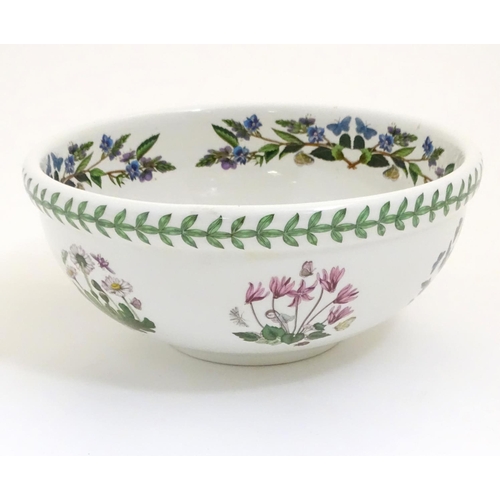 133 - Five items of Portmeirion wares comprising a large bowl, an oval serving plate, two dishes and a cer... 