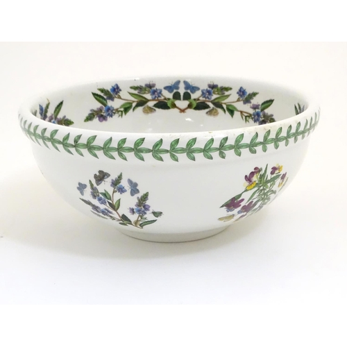 133 - Five items of Portmeirion wares comprising a large bowl, an oval serving plate, two dishes and a cer... 