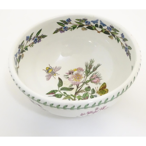 133 - Five items of Portmeirion wares comprising a large bowl, an oval serving plate, two dishes and a cer... 