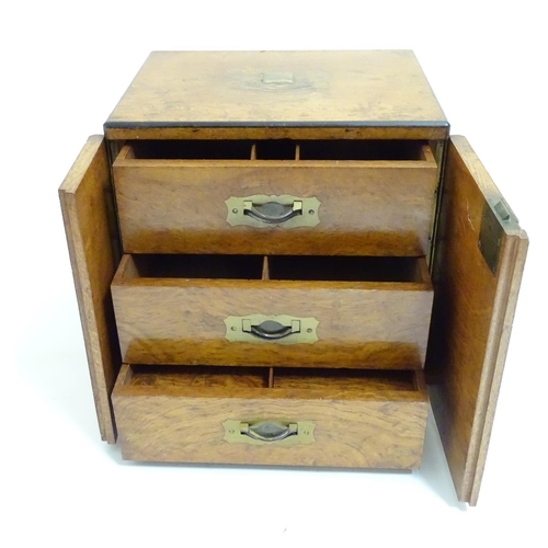 1016 - A small late 19thC oak and walnut cased military campaign chest with twin brass recessed handles, th... 