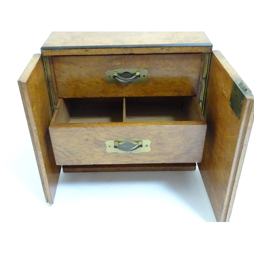 1016 - A small late 19thC oak and walnut cased military campaign chest with twin brass recessed handles, th... 