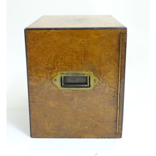 1016 - A small late 19thC oak and walnut cased military campaign chest with twin brass recessed handles, th... 