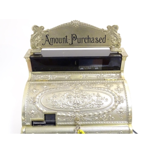 1024 - A late 20thC electric National Cash Register / till, model no. 2114-1708. Approx. 22