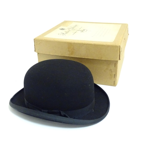 1030 - An early 20thC handmade fur felt bowler hat contained within original Herbert Johnson hatters box.