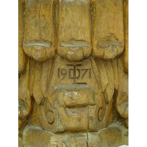 1037 - A 20thC carved wooden sculpture titled Tragic Muse to base, monogrammed TD and dated 1971 to side. D... 