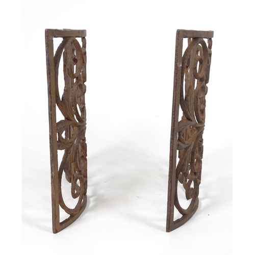 1057 - Two wrought iron architectural panels, of waved form, 16