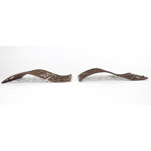 1057 - Two wrought iron architectural panels, of waved form, 16