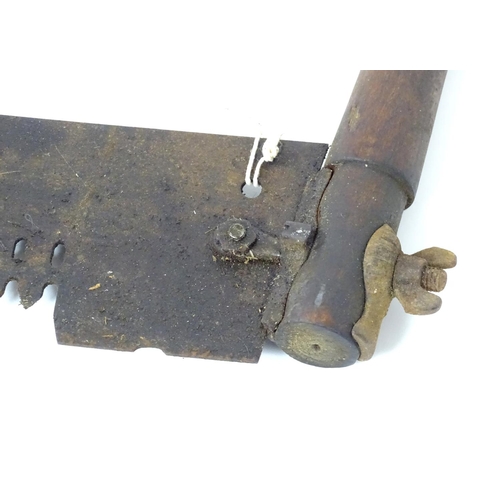 1064 - Two late 19th - early 20thC crosscut saws, one-man and two-man examples, 47