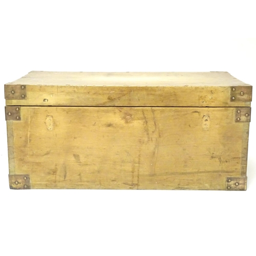 1078 - An early to mid 20thC hardwood box with brass carrying handles and brass mounts to the corners along... 