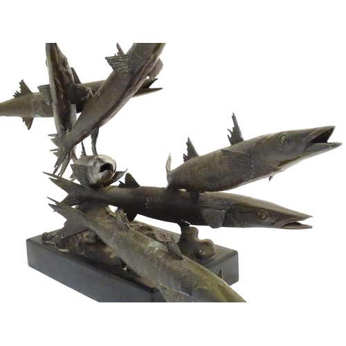 1091 - A 20thC limited edition bronze sculpture modelled as a shoal of barracuda fish. Signed Somchai and d... 