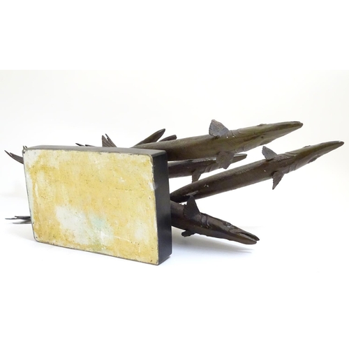 1091 - A 20thC limited edition bronze sculpture modelled as a shoal of barracuda fish. Signed Somchai and d... 