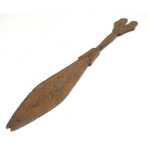 1098 - Ethnographic / Native / Tribal: A carved wooden ceremonial paddle formed as a stylised fish with car... 