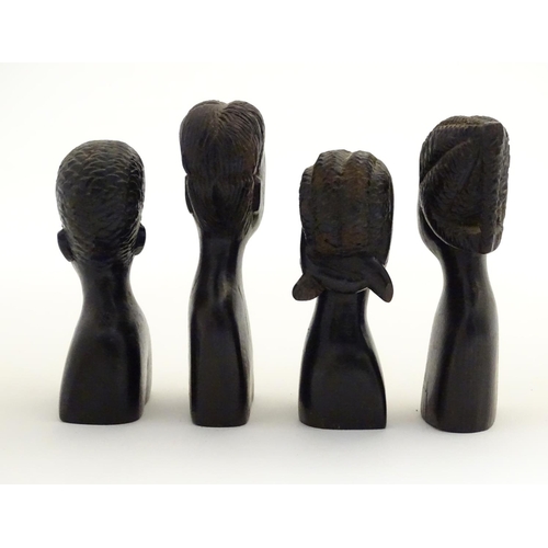 1099 - Ethnographic / Native / Tribal: Four carved wooden heads, two male, two female. Approx. 3