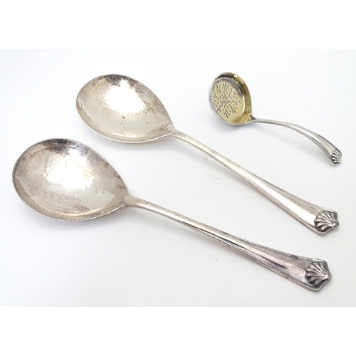 292 - A cased serving / Strawberry set , the servers with hammered decoration together with a sifter spoon... 