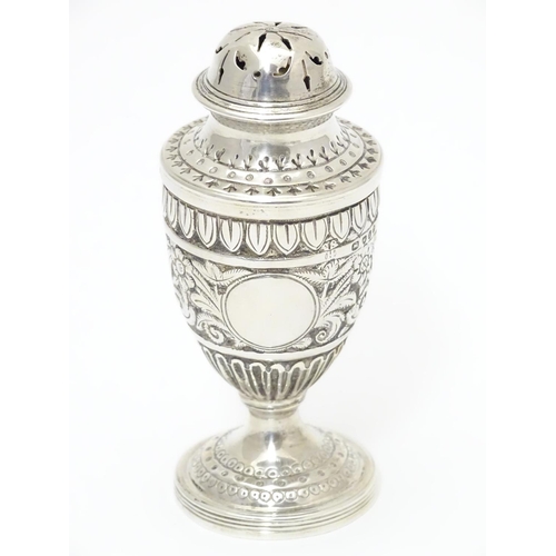 322 - A Victorian silver caster / pepperette  hallmarked London1886 maker Charles Stuart Harri. Approx 3 1... 