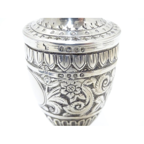 322 - A Victorian silver caster / pepperette  hallmarked London1886 maker Charles Stuart Harri. Approx 3 1... 