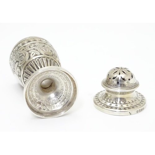 322 - A Victorian silver caster / pepperette  hallmarked London1886 maker Charles Stuart Harri. Approx 3 1... 