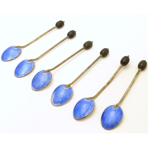 324 - A cased set of six silver and enamel coffee bean spoons, the handles with coffee beans decoration, t... 