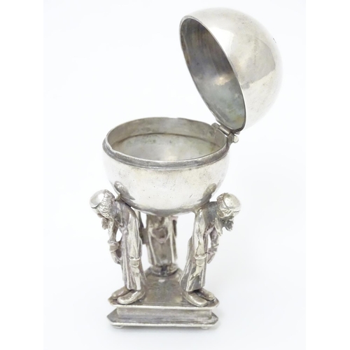 328 - A Russian silver Judaica besamim / balsaminka spice holder, the spice ball supported by three bowing... 