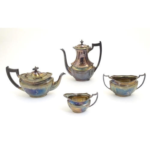 428 - A 4 piece silver plate teaset comprising cream jug, sugar, teapot and hot water pot. The tallest app... 