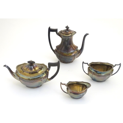 428 - A 4 piece silver plate teaset comprising cream jug, sugar, teapot and hot water pot. The tallest app... 