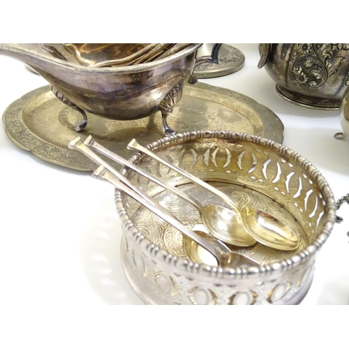 433A - A large equanimity of assorted silver plated wares to include candlesticks, flatware, serving dishes... 