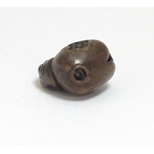 863 - A Japanese ojime bead formed as a stylised crab. Approx. 5/8