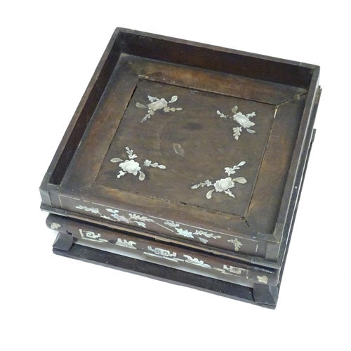 869 - A Chinese hardwood stand of squared form with decorative abalone inlay. Approx. 3 1/2