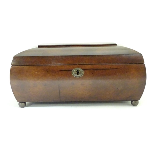 878 - A late 20thC hardwood box of sarcophagus form with a fitted lift out tray within. Approx. 13