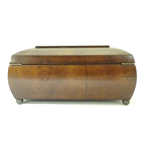 878 - A late 20thC hardwood box of sarcophagus form with a fitted lift out tray within. Approx. 13