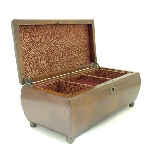 878 - A late 20thC hardwood box of sarcophagus form with a fitted lift out tray within. Approx. 13