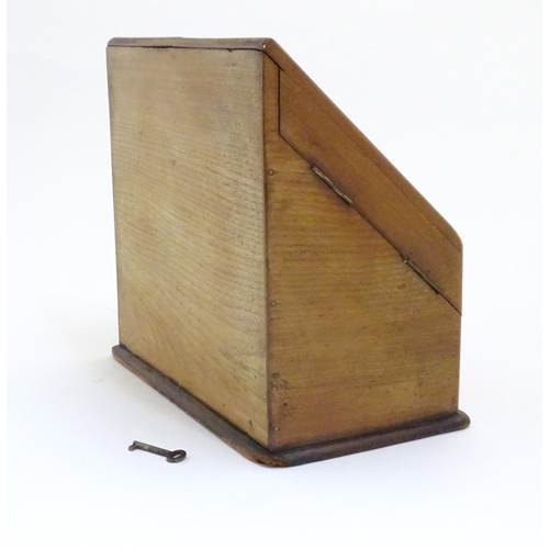 879 - A late 19th / early 20thC stationary / correspondence cabinet with folding doors and fitted interior... 