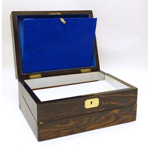 880 - A Victorian coromandel veneered writing box / slope with correspondence pocket and fitted interior. ... 