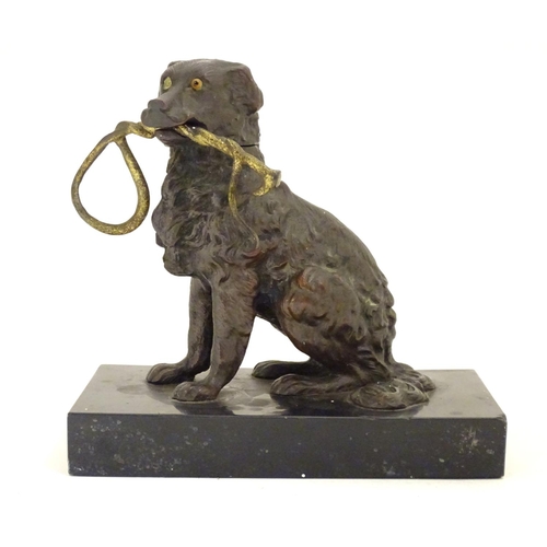 893 - A late 19th / early 20thC bronze desk top inkwell modelled as a dog on a rectangular base. Approx. 5... 