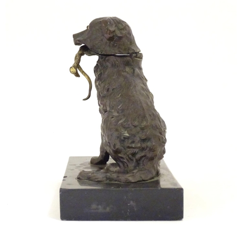 893 - A late 19th / early 20thC bronze desk top inkwell modelled as a dog on a rectangular base. Approx. 5... 