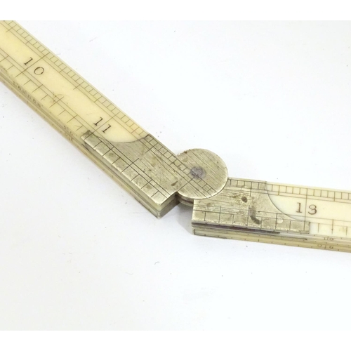 897 - A 19thC Troughton & Simms folding surveyors rule. 24