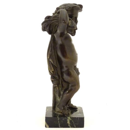 899 - A late 19thC cast bronze figure of a cherub representing Autumn, holding a sheaf of wheat over his s... 