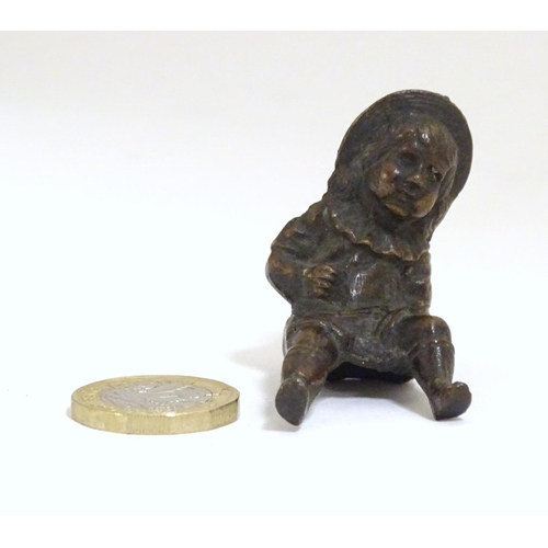 900 - A late 19thC bronze modelled as a young girl with a hat. Approx. 2