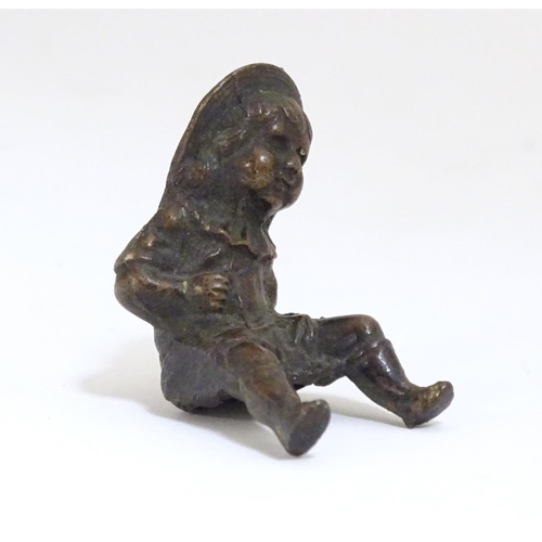 900 - A late 19thC bronze modelled as a young girl with a hat. Approx. 2