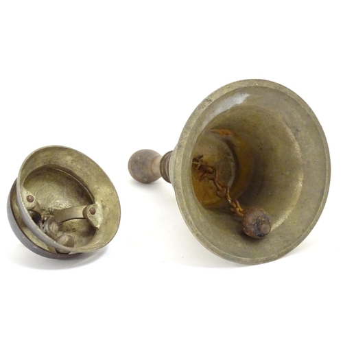 909 - Two late 19th / early 20thC bells comprising a counter / desk bell and a brass hand bell with a turn... 