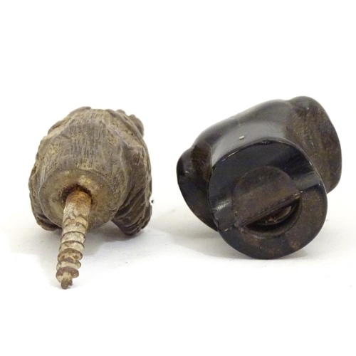 917 - Two late 19th / early 20thC carved wooden dog heads, one a whistle. Largest approx. 2 1/2