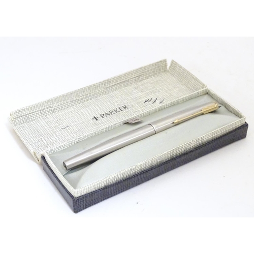 919 - A 20thC Parker convertible fountain pen with 14ct gold 585 nib. Contained within original box, with ... 