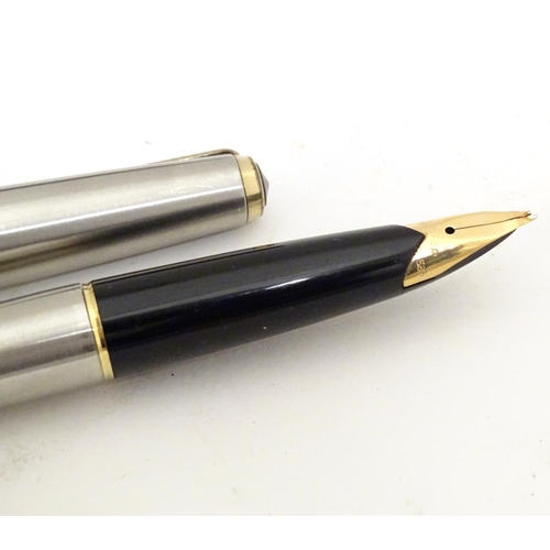 919 - A 20thC Parker convertible fountain pen with 14ct gold 585 nib. Contained within original box, with ... 