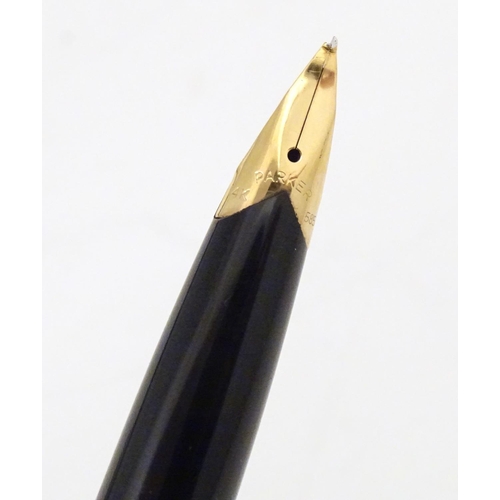 919 - A 20thC Parker convertible fountain pen with 14ct gold 585 nib. Contained within original box, with ... 