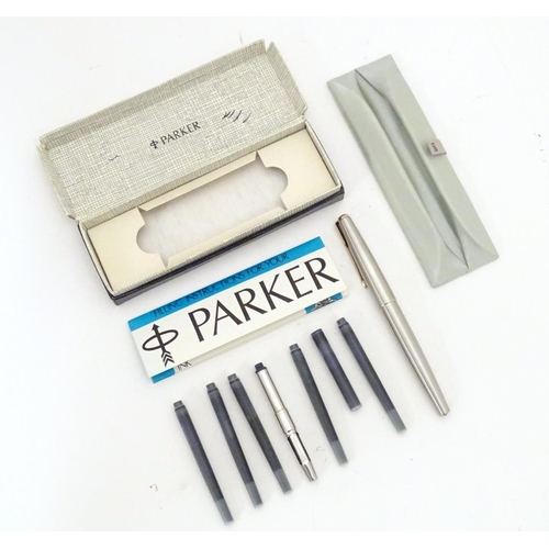 919 - A 20thC Parker convertible fountain pen with 14ct gold 585 nib. Contained within original box, with ... 